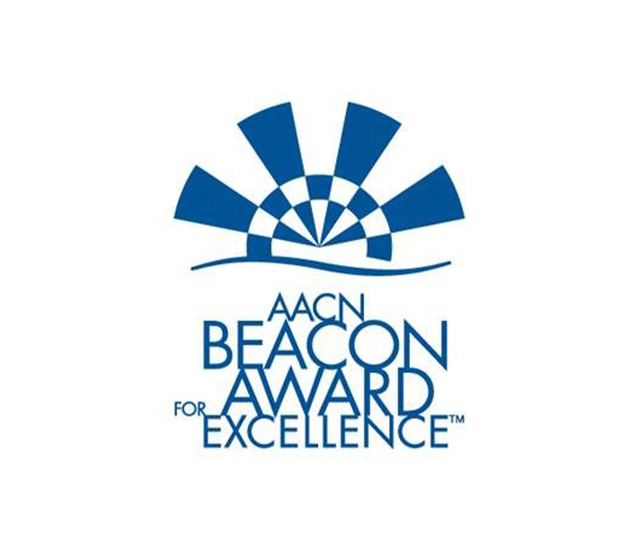 AACN Beacon Award for Excellence™ logo: a blue and white checkered sun-like graphic over a wave
