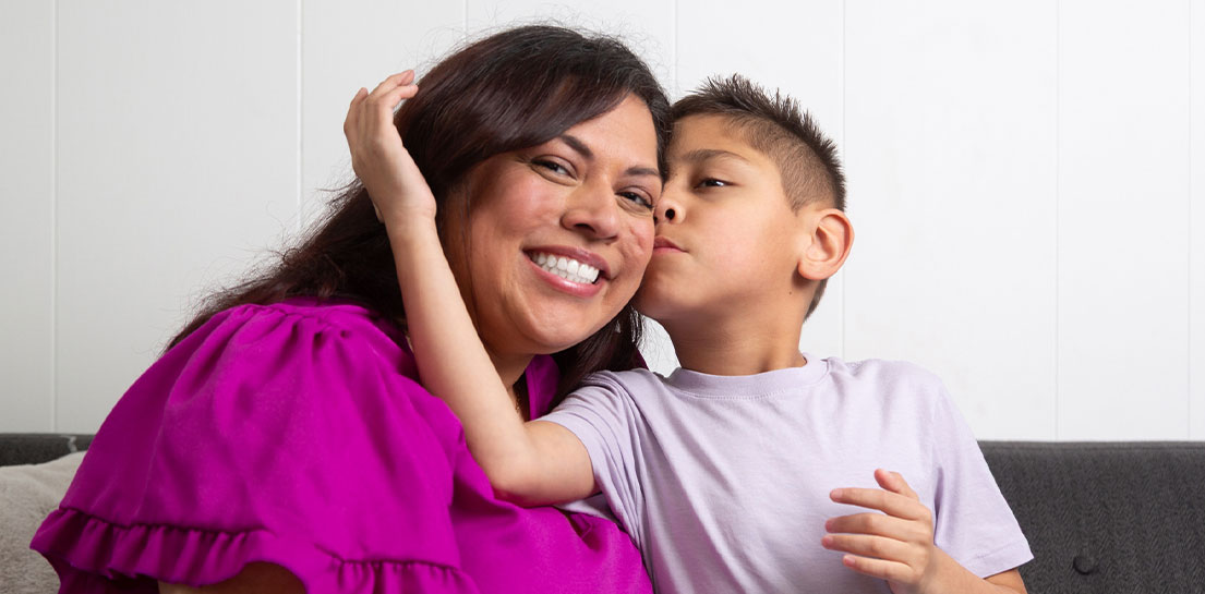 Breanna Hernandez getting a hug from her son MJ