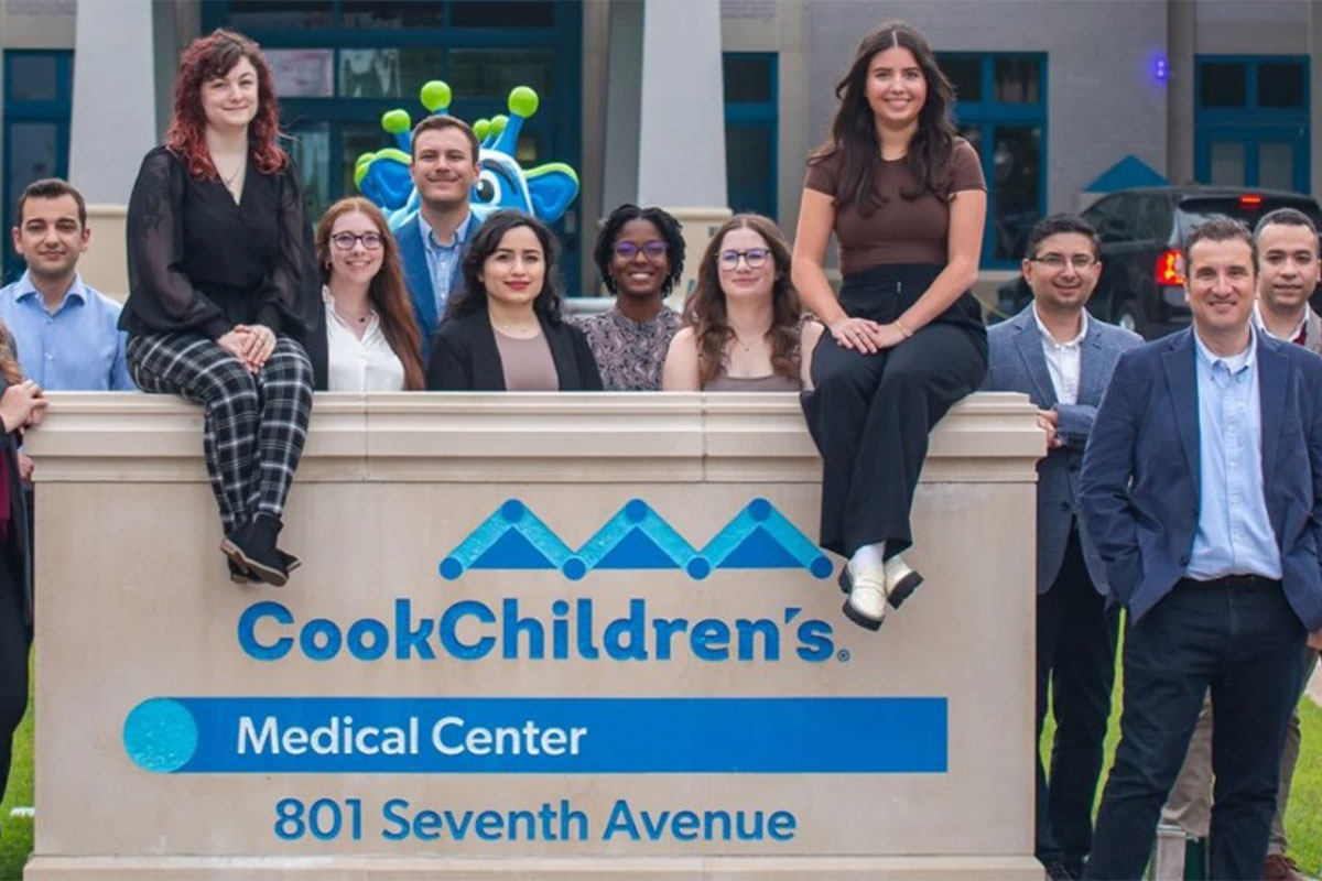 Dr. Christos Papadelis with his neurosciences research team in front of Cook Children&rsquo;s Medical Center in Fort Worth, Texas